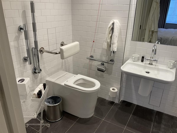 Image of a bathroom with a toilet and sink