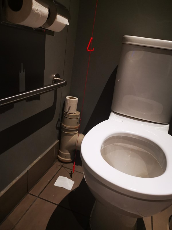 Cord reaches down to the floor. Just me or would you rather it be on the other side where if you did fall you could reach? Horizontal bar with the sink the other side of it.