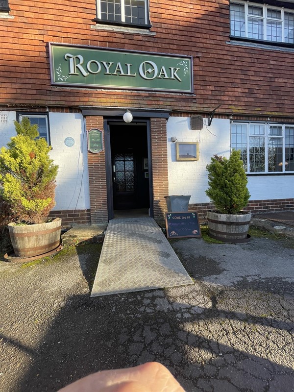 Image of a ramp going into a pub entrance