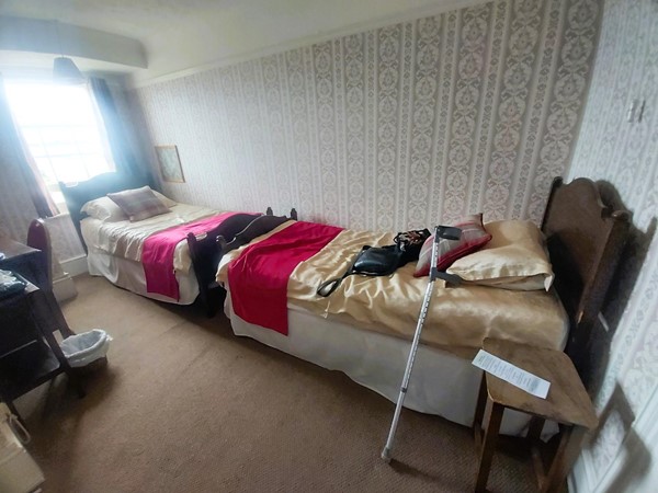 Image of two beds in a room