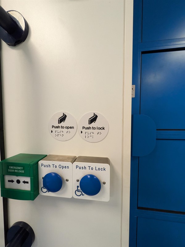 Image of lock and unlock buttons in the Changing Places toilet