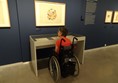 A wheelchair-friendly display case