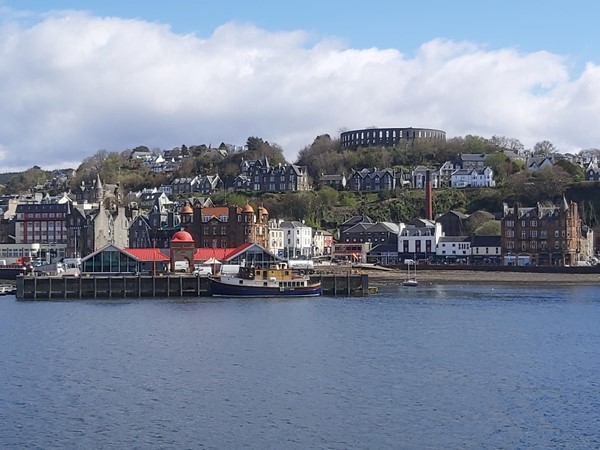 Image of a town on a hill with a body of water