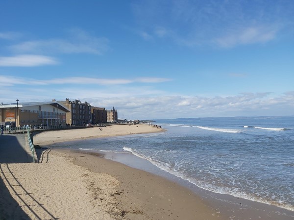 Image of a promenade and the sea