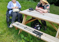 People at a picnic bench