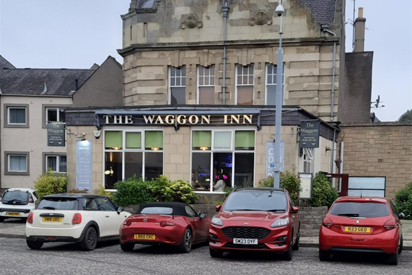 Image of a building with a sign