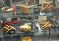 Image of a display case with different types of food