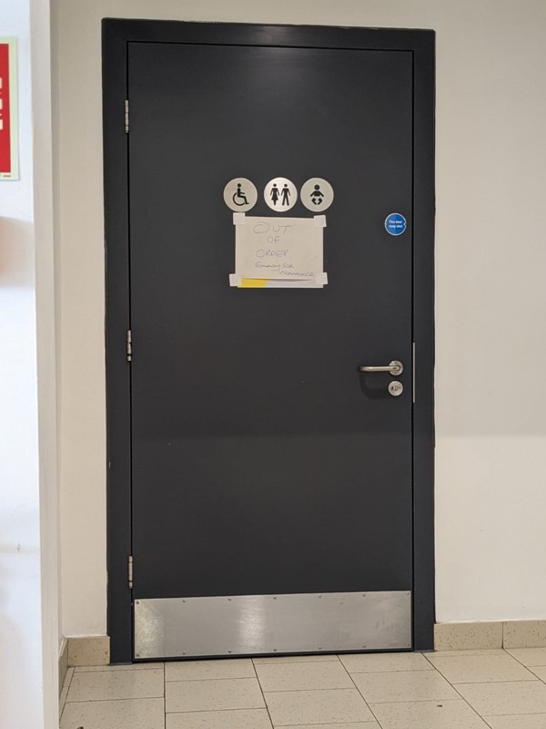 Image of a toilet door