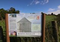 The welcome sign at Boath Doocot