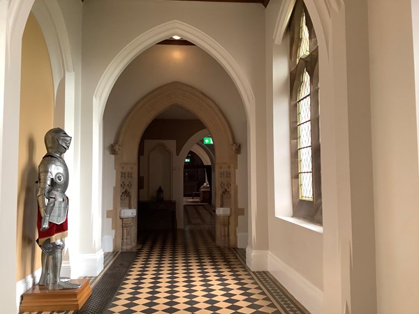 Picture of a suit of armour in a corridor