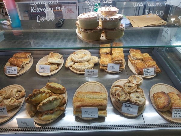 Image of a display case with pastries and pastries