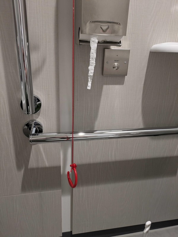 Image of the accessible toilet showing the red cord