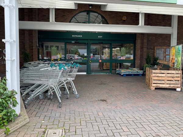 Image of a group of shopping carts outside of a store