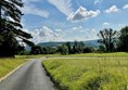 Image of a road leading to a field