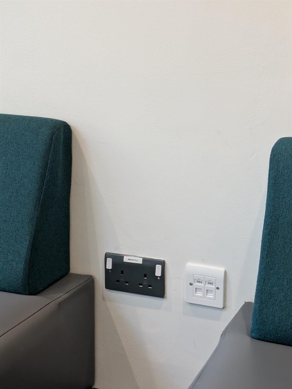 Image of seating area and power sockets