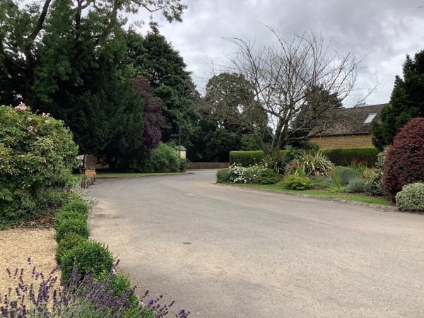 Arriving along driveway to hotel foyer