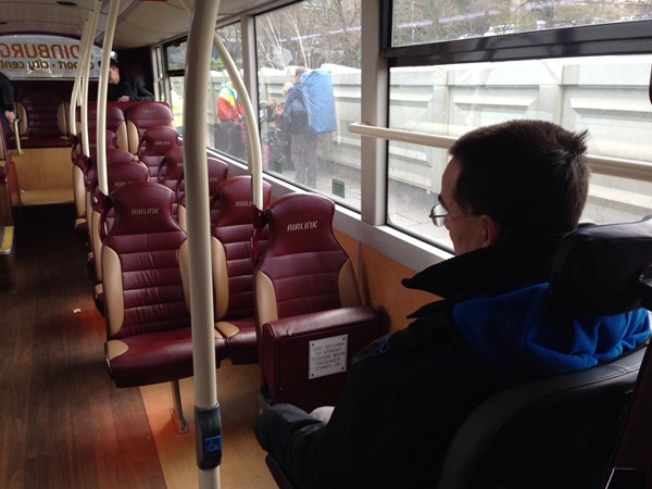 Picture of a passenger on Airlink Lothian Bus