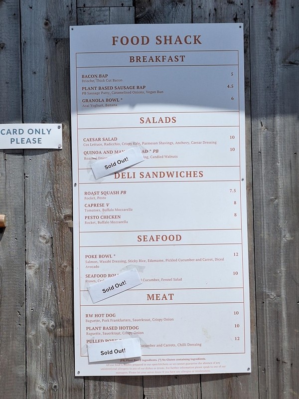 Image of a menu on a wood surface