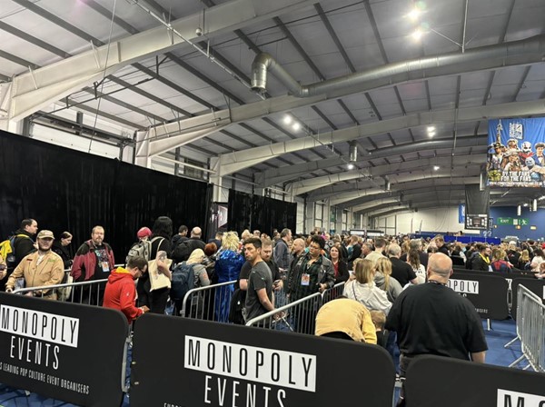 Image of a crowd of people in a large building