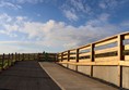 Access ramp with nice gentle gradient and fencing.