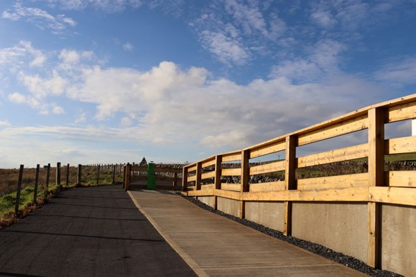 Access ramp with nice gentle gradient and fencing.