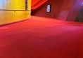 Image of a red carpet in a building