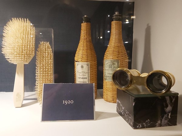 Bottles, brushes and a pair of binoculars from the 1920s