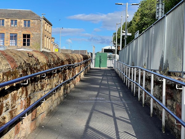 The ramp up to the railways station's platform