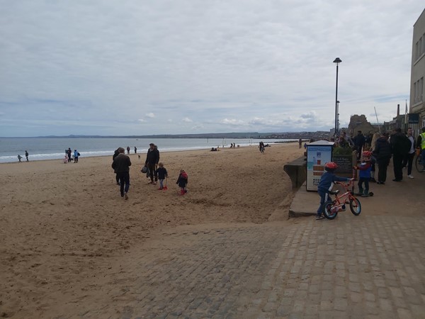 Image of a beach with people on it