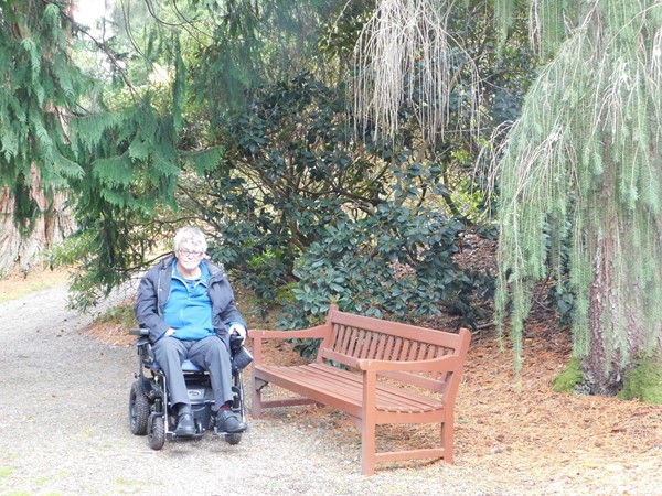 Yours truly beside one of the many benches in Dawyck Gardens