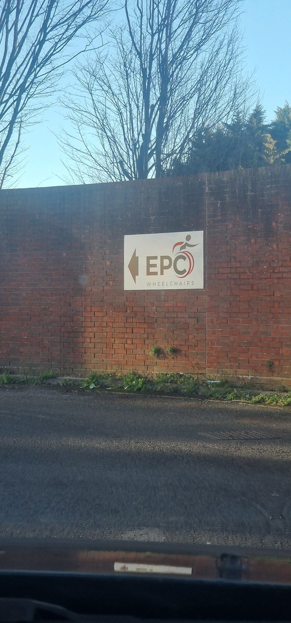 Image of a sign on a brick wall