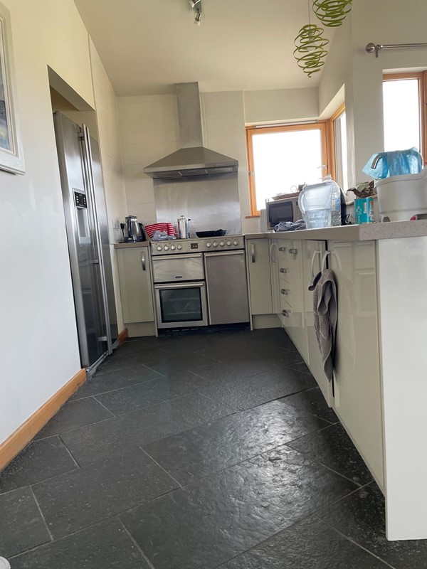 Image of a kitchen with a stove and oven