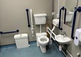 Inside standard accessible toilets