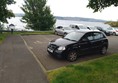 Image of a car parked in a car park