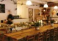 Long table with chairs in a restaurant