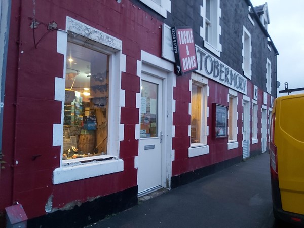 Image of a red building with white trim