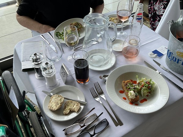 Image of a table with food and glasses