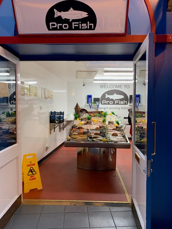 One of the fishmongers in the market