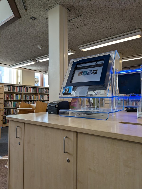 Image of chairs and book shelves