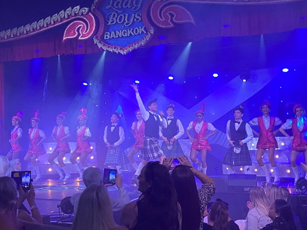 group of most of the cast of the 'Lady Boys' in Scottish dress.