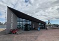 Dundee Cycle Hub. A photo of the building and the rack of bikes outside.