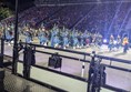 Image of a pipe band on a stage