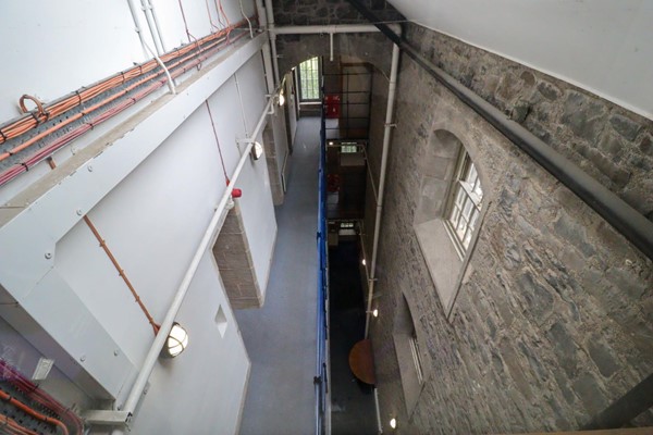 Looking down onto the prison corridors with balcony and cells off it.