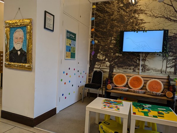 image of seating area in the Andrew Carnegie Birth Museum