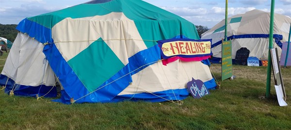 Image of a tent with a sign