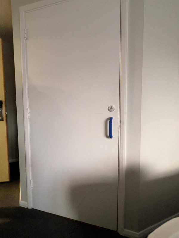 Image of door to the toilet in the accessible hotel room