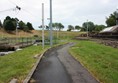 One of the paths through the white water park, with good tarmac surface and a slight gradient.