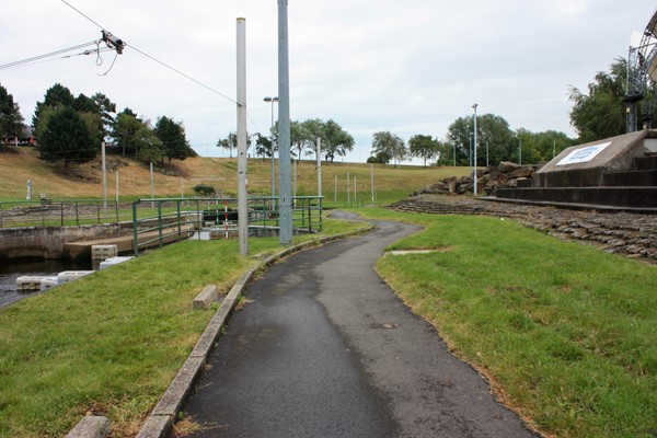 One of the paths through the white water park, with good tarmac surface and a slight gradient.