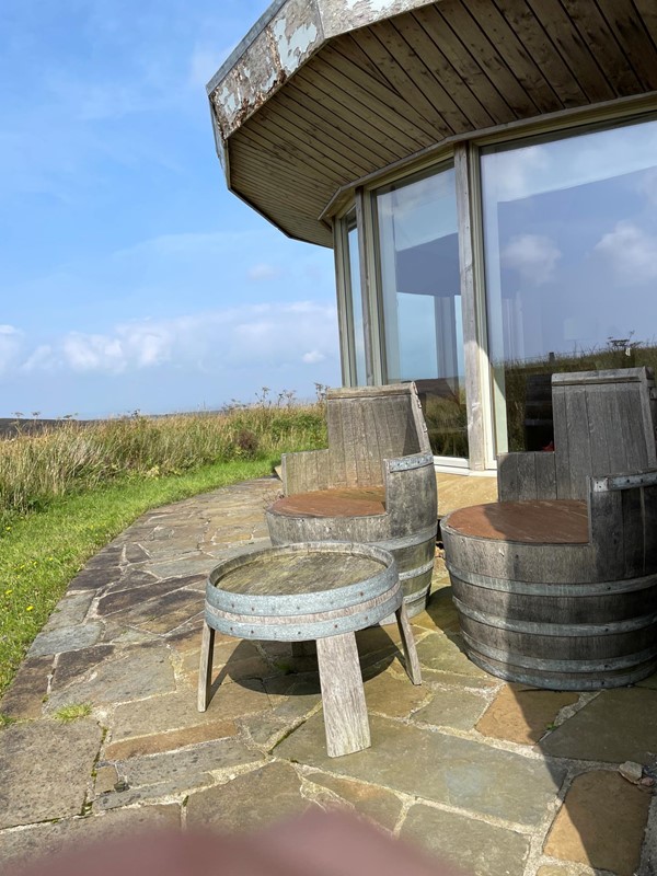 Image of a patio with chairs and a table