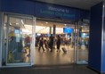 Image of a group of people walking in a building